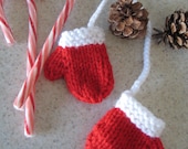 Pair of miniature decorative mittens on a string