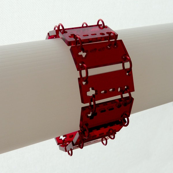 NES bracelet - red tint with red rings