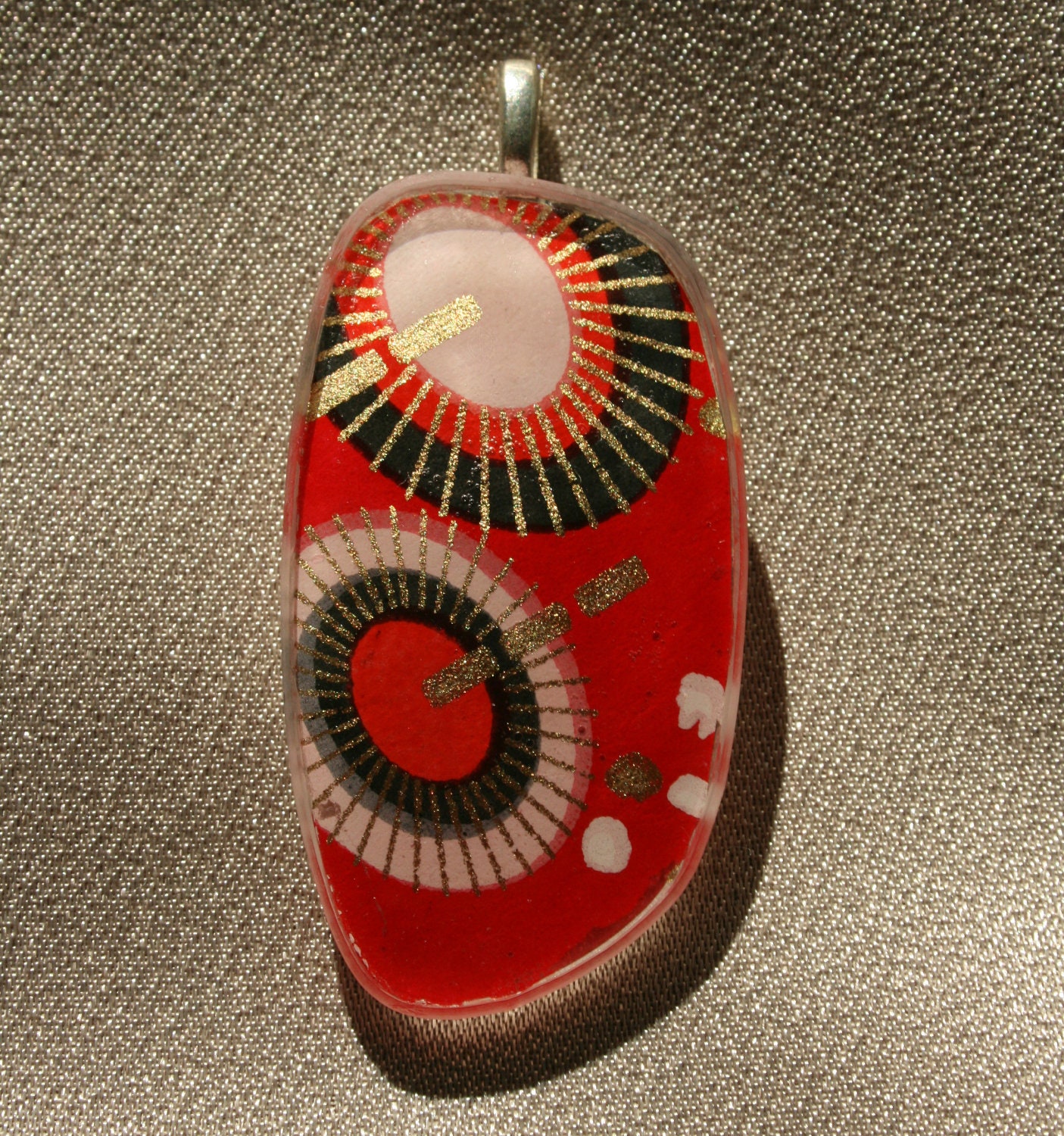 Recycled Eyeglass Lens Pendant (with Chain)--Black and Pink Umbrellas on a Red Background