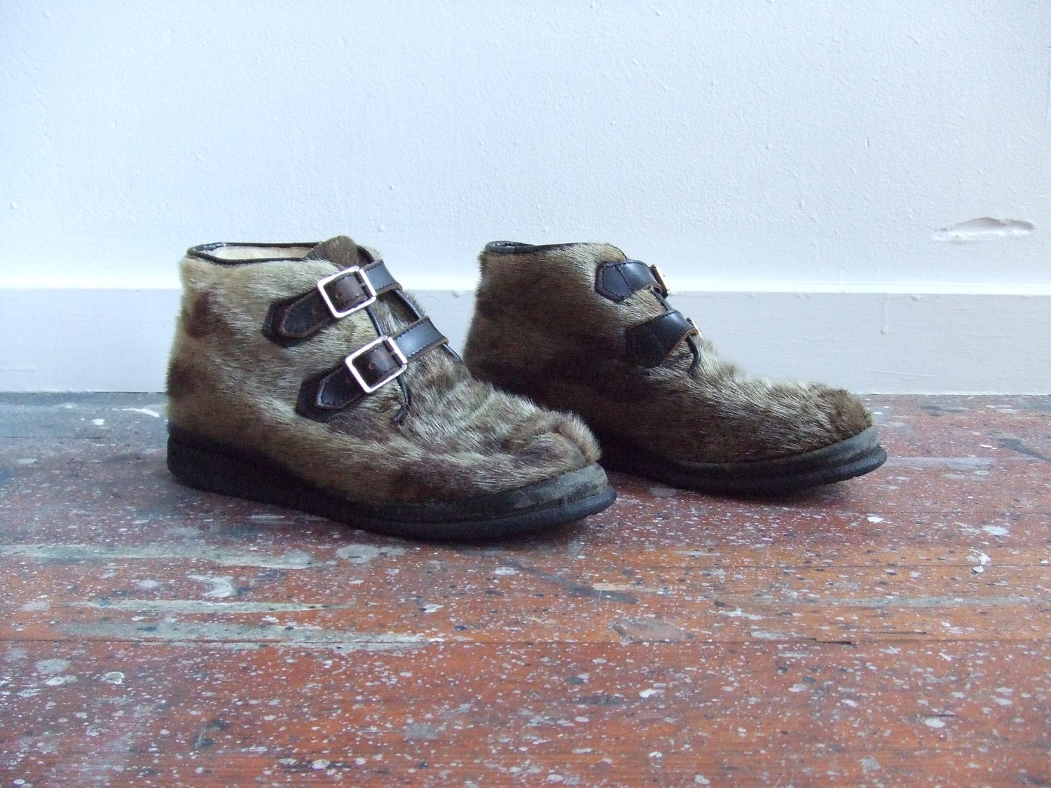 RESERVED / Vintage 1970s seal fur boots with leather buckles