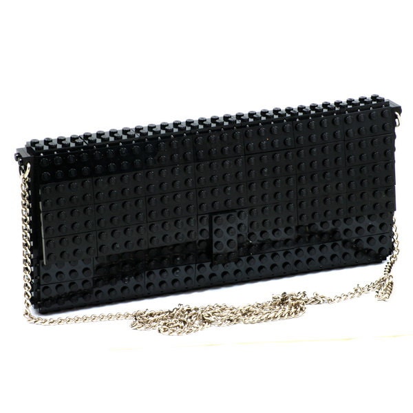Black clutch on a chain made entirely of LEGO bricks