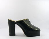 Vintage 1970s black platform shoes. Leather platform heels