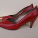 80s red leather shoes with gold tone metal scroll work/ toe and heel /9