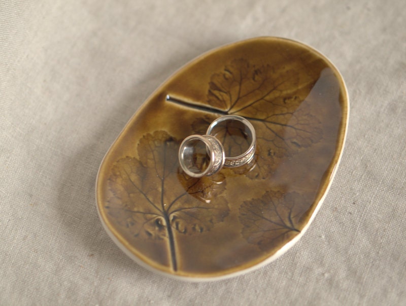 Fossil - A rustic trinket dish with an impression of a Coral Bell leaves.