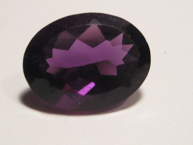 faceted Amethyst gemstone .....    large gemstone .......  17 x 13  x 8  mm ......     1405