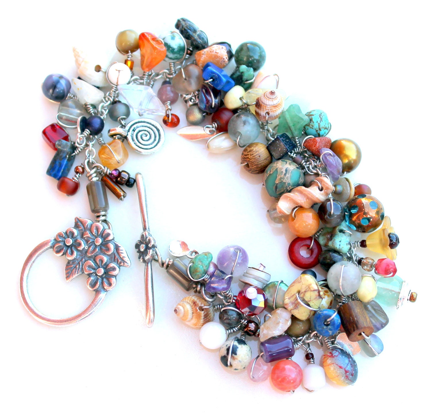 tactile wonderland. bracelet. muted multicolored flower nature clasp uniquenecks wire wrapped beaded bracelet.