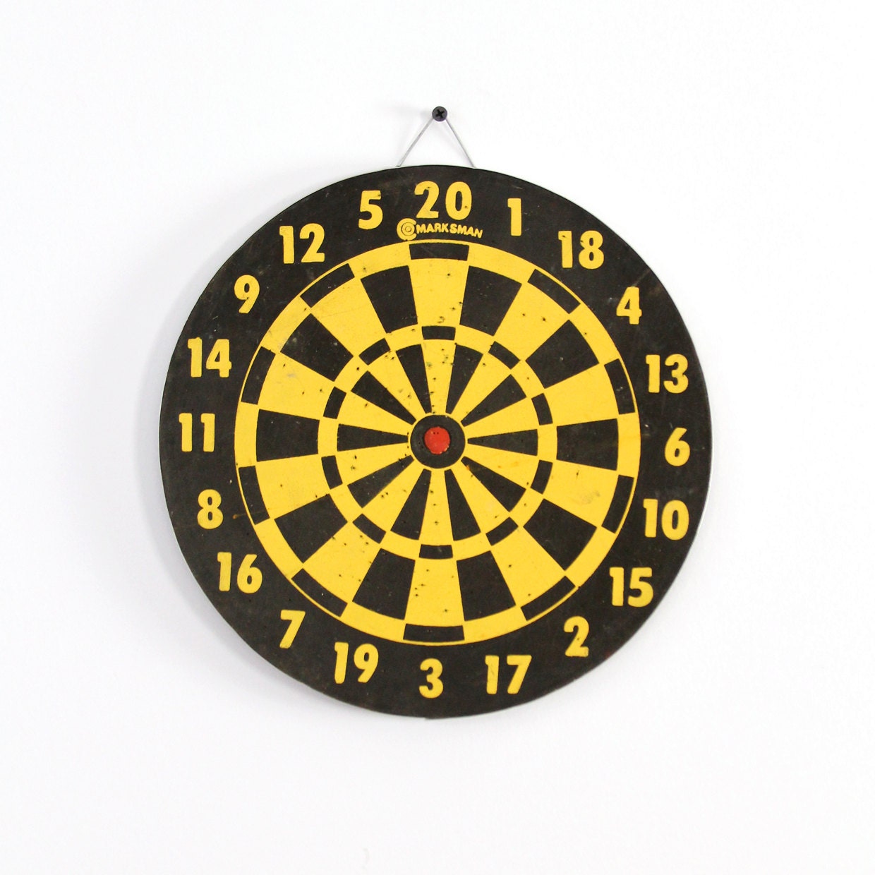 yellow and black dart board