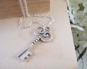 Retro style skeleton key- petite and delicate metal necklace