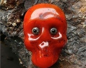 Translucent Orange Skull With Eyeballs and Glitter