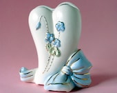 Heart shaped vintage vase with blue bow and forget me nots and 22 kt gold