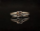 Silver and Gold double knot ring. Duo, two tone twotone 14K Gold Sterling Silver. Solid gold, promise ring, sister ring, commitment ring.