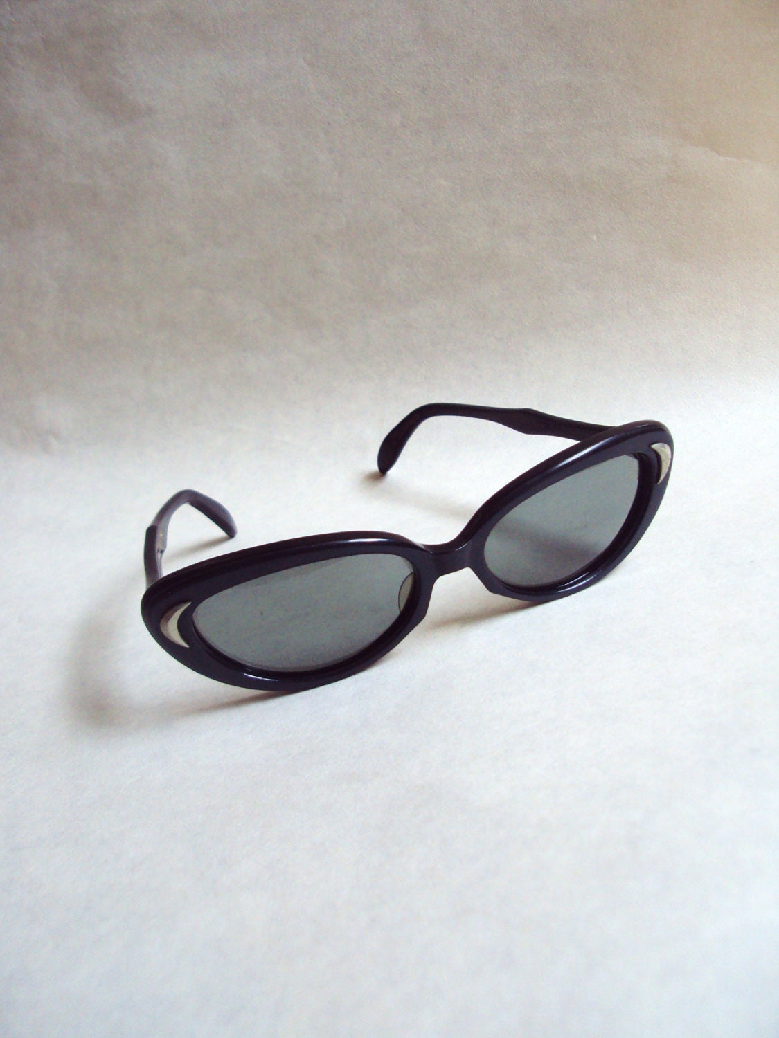 1960s Pearlized teal green rounded sunglasses by Polaroid