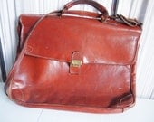 Vintage 1980s soft brown loved up leather breifcase bag