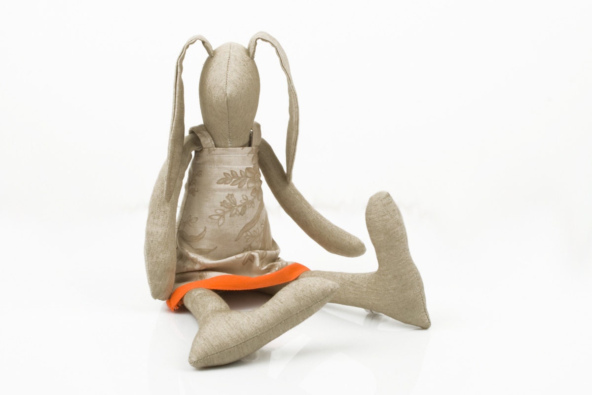Plush Minimalist Bunny In bright earth tones Wearing beige floral dress , timo handmade fabric doll