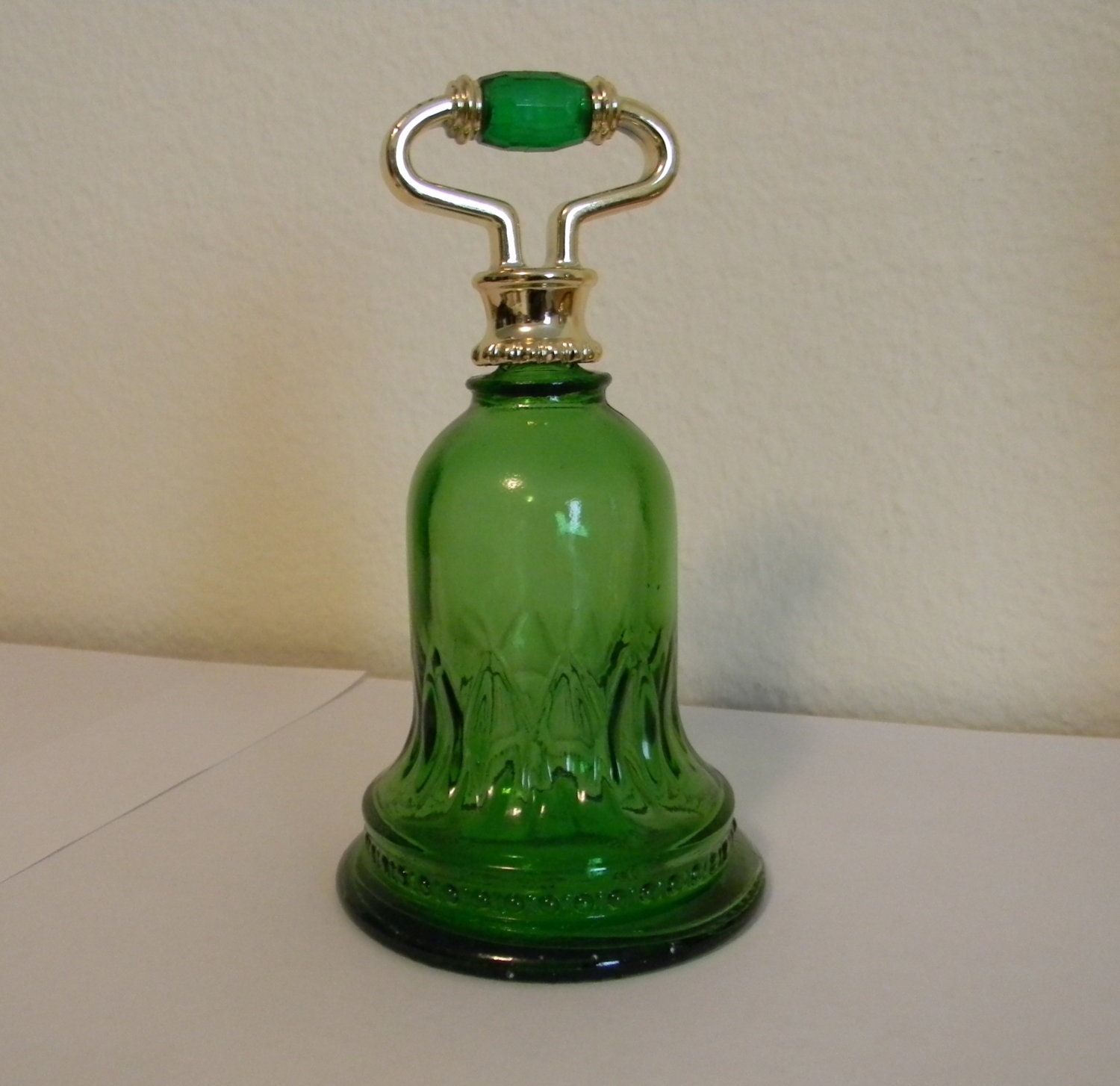 green perfume bottle