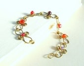 Brass bracelet yellow gold red wire wrapped jewelry