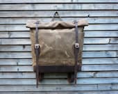 Waxed canvas extra wide rucksack/backpack with roll up top and waxed leather shoulderstrap,handle and leather bottem COLLECTION UNISEX