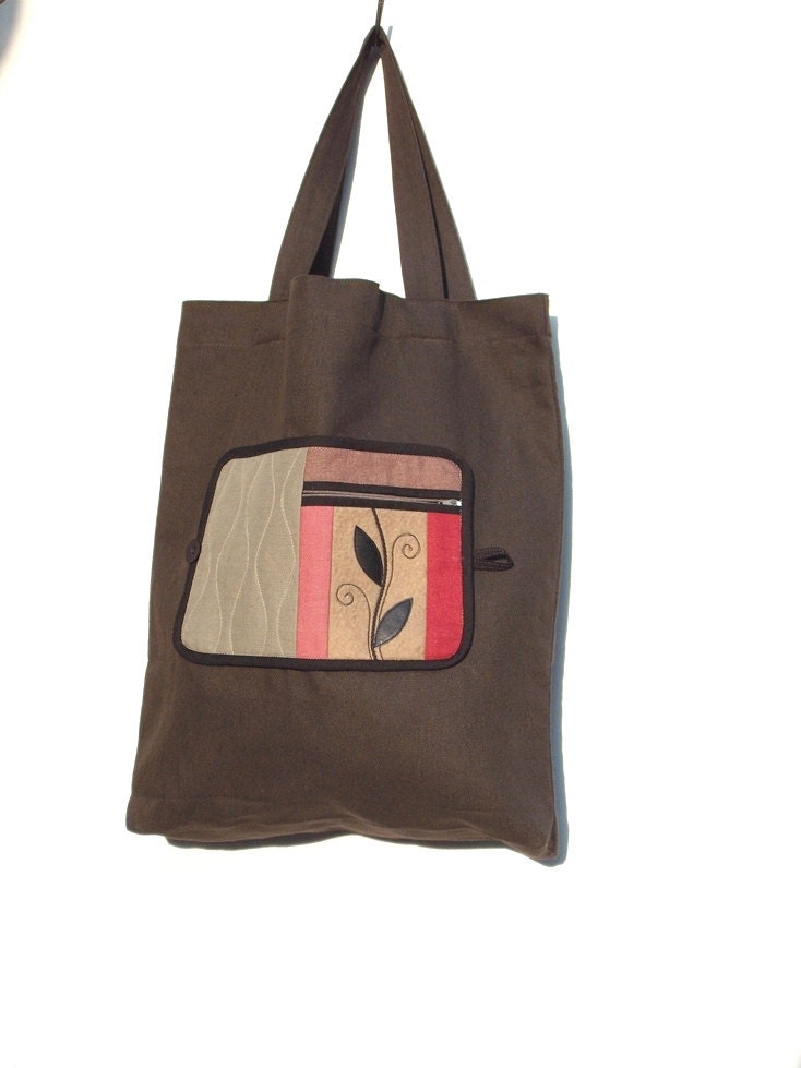 NEW COLLECTION Fold-up Leafy  Eco Shopping Bag made from brown fabric ornamented with leather leafy motif on a wool felt base.