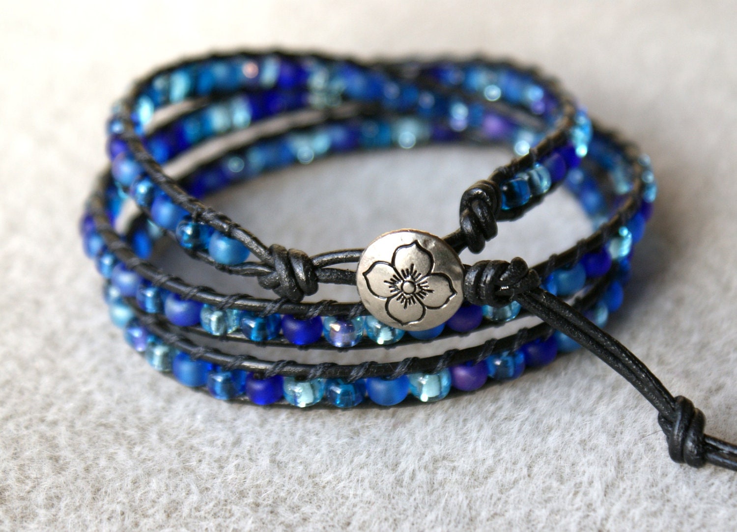 Blue Sea Bohemian beaded leather bracelet, 3x Wrap, Chan Luu Style, dark aqua, sapphire, silver flower