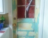 Faux door painting on white hollow core door.