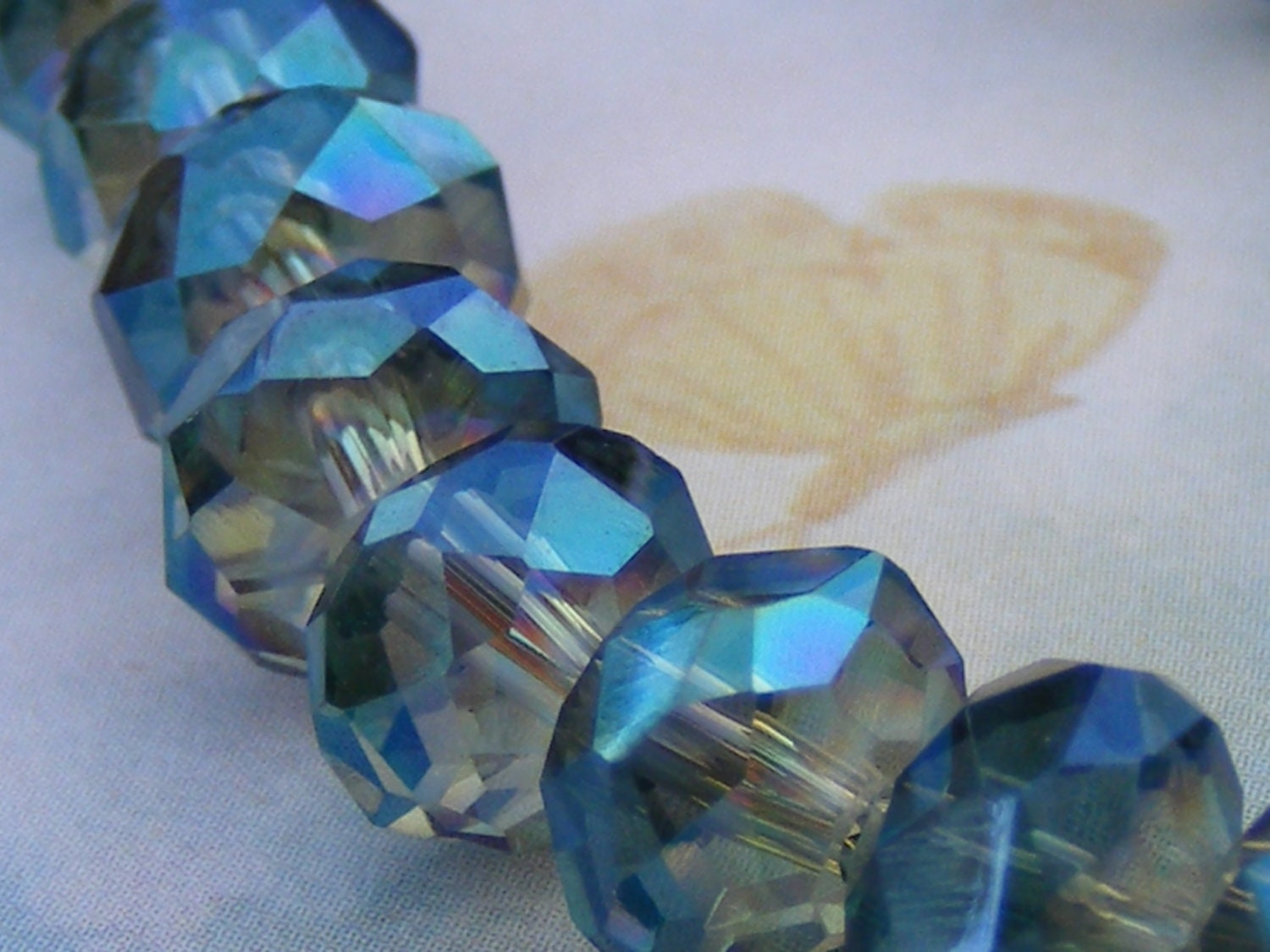 CARIBBEAN SPLASH . faceted chinese crystal glass bead . 8mm x 5mm . blue green . 36 ea