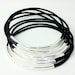 Black leather bangles with Silver plated tubes