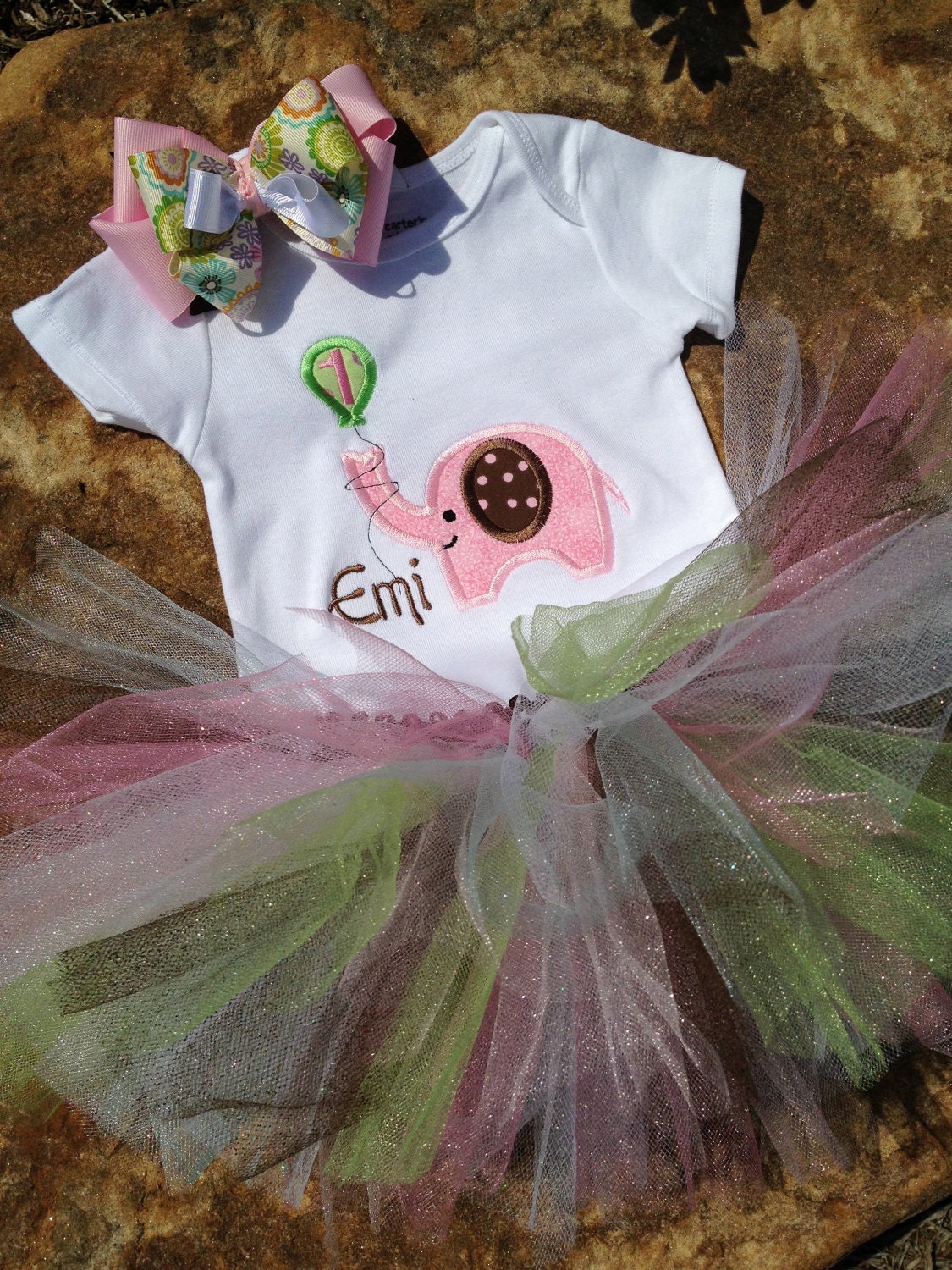 1st birthday elephant onesie with name, colorful tutu, and matching hair bow