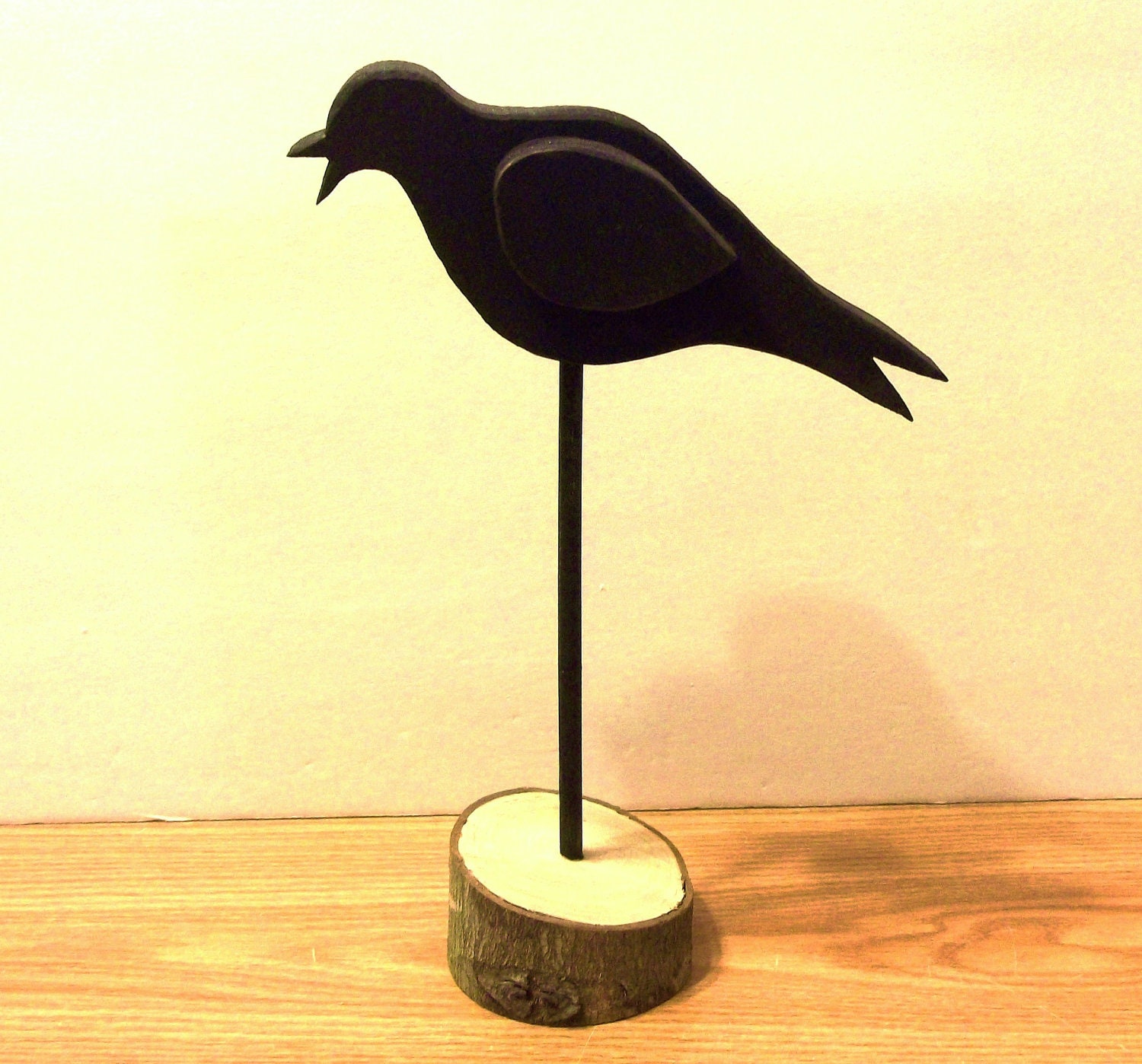 This Bird Is Made of Wood and Is All Ready To Perch In Your Home Decor