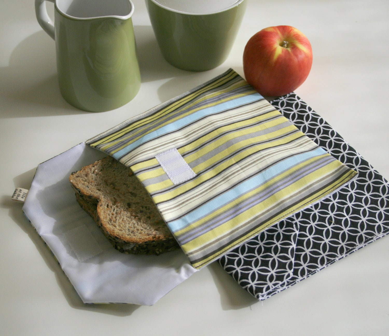 pair of reusable, lined sandwich bags in black and white & amy butler stripe