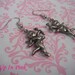 Cupid's Victim Dangle Earrings