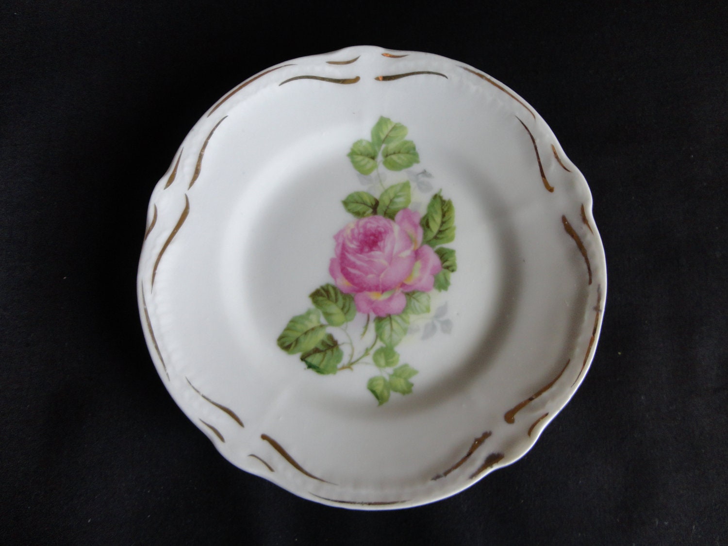 Vintage "Rose" plate 1920s or 30s small, gold edge trim open pink rose with leaves in center slight scalloped edge "Bavaria"