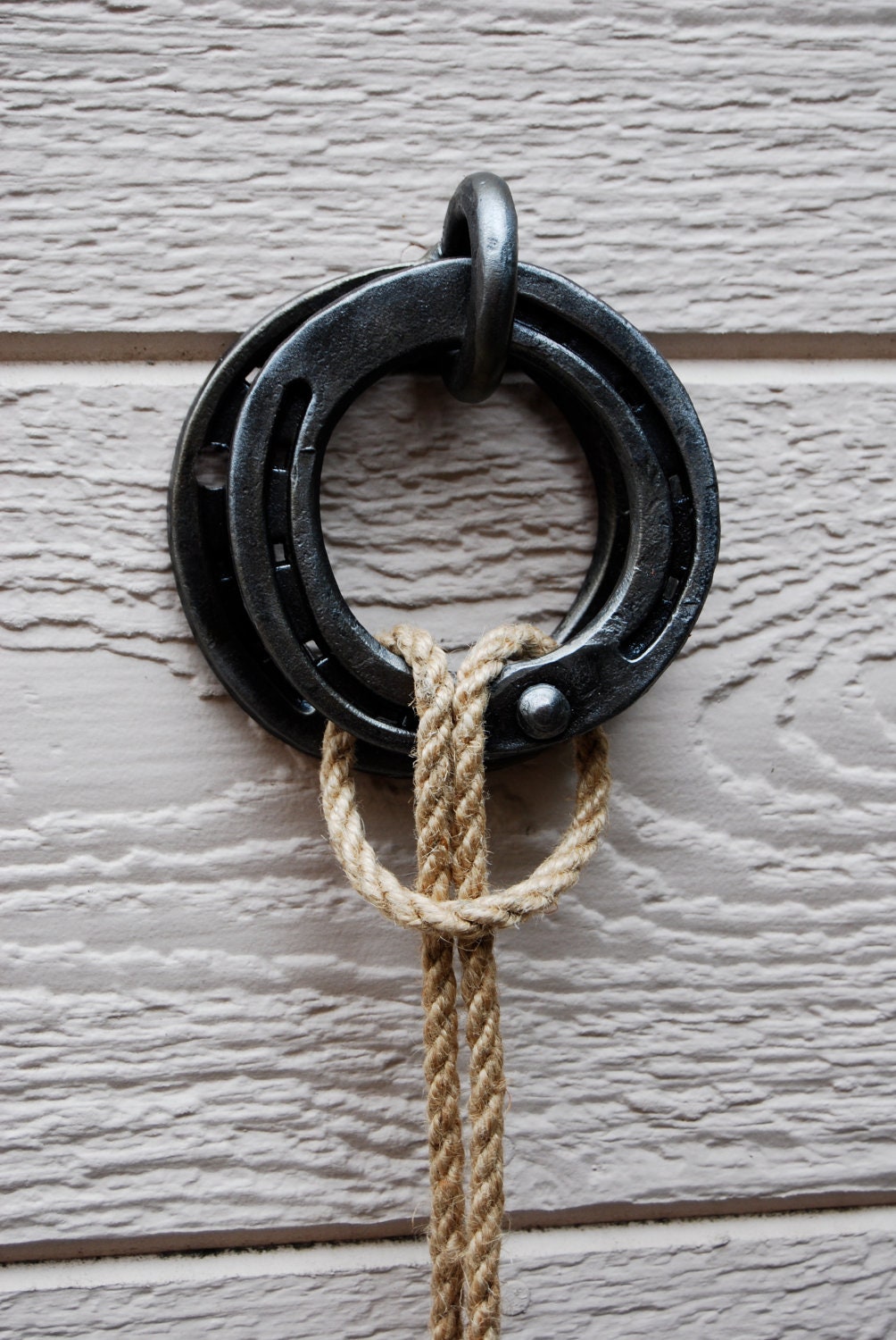 Round horseshoe hitching post handle (sm), or use as tie off for dog, tie up,or door pull. Made to order.
