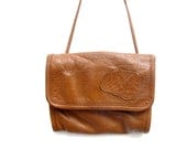 forever falchi. vintage 80s carlos falchi sepia leather bag. perfect little purse. designer vintage