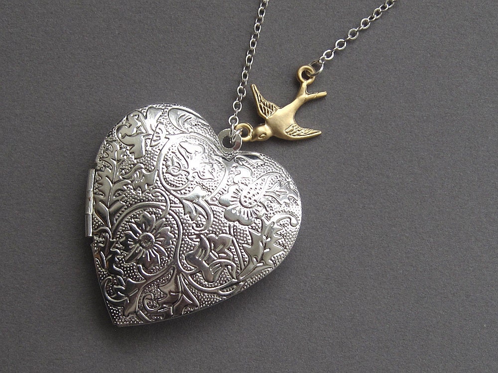 Silver heart locket necklace, large art nouveau inspired floral locket, gold flying swallow bird, silver plated chain