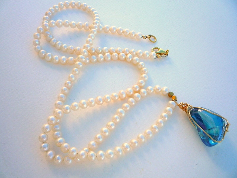 Freshwater Pearl long necklace with Aqua Aura Crystal Quartz pendant.