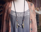 ada.  a bohemian gemstone and feather necklace.