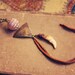 rust. a bohemian fringe coyote tooth necklace.