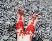 Red barefoot sandals tatting - summer fashion.