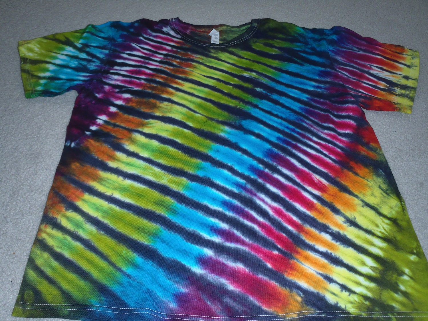 Tie dye woman's large Hanes t-shirt, so many gorgeous colors I can't list them all, front and back.