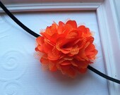 Orange Satin and Tulle Flower attached to a Black Skinny Elastic Headband