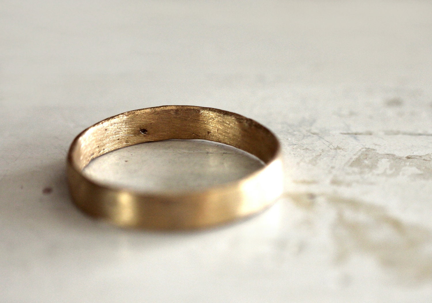 A rustic gold wedding band. 18k. Lulu