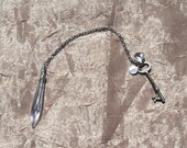 Fortune telling psychic abilities pendulum antique skeleton key antique crystal