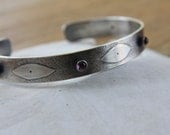 Sterling cuff bracelet with garnets and leaf texture