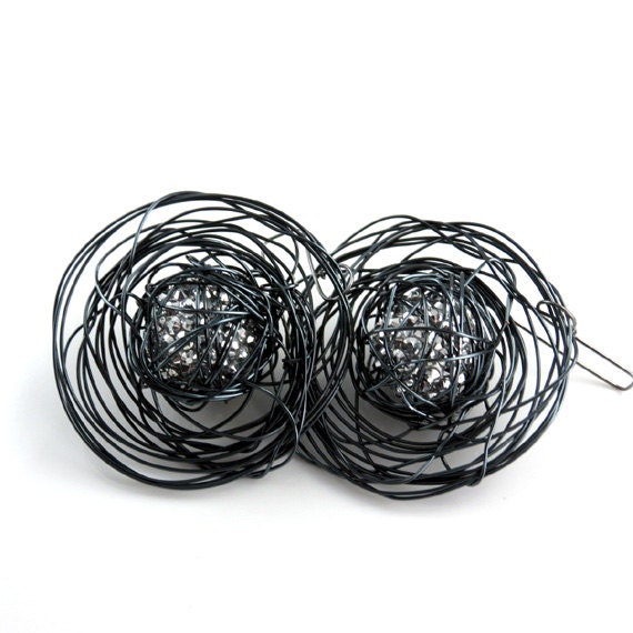 Wire Abstract Stylish Modern Earrings. Wire Disc with sparkly shiny silver  ball inside.