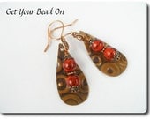 Embossed Copper Teardrop Earrings with Red Glass Dangles