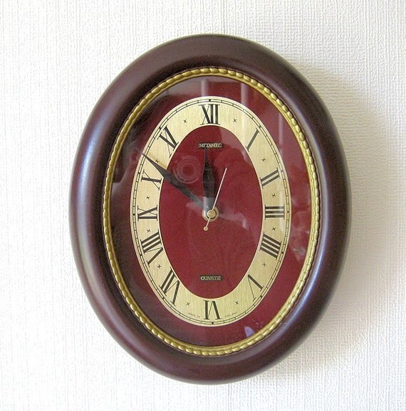 Metamec Wall Clock Oval Mahogany Recycled Battery by AKClocks