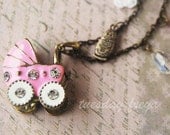 Baby carriage - a vintage charm necklace