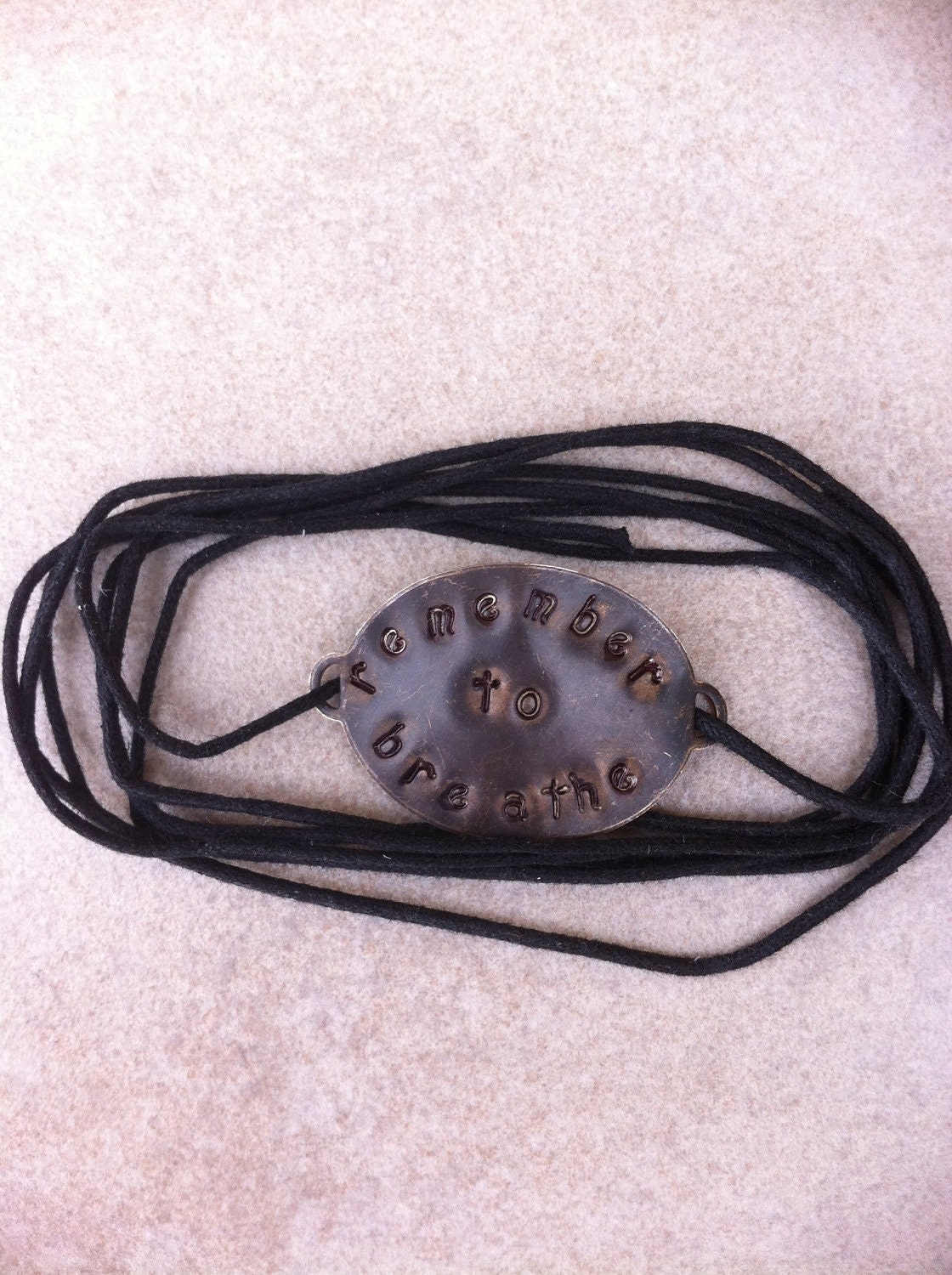 Women's or Unisex Black Cotton Cord Inspiration Wrap Bracelet with Hand Stamped Brass Tag "remember to breathe"