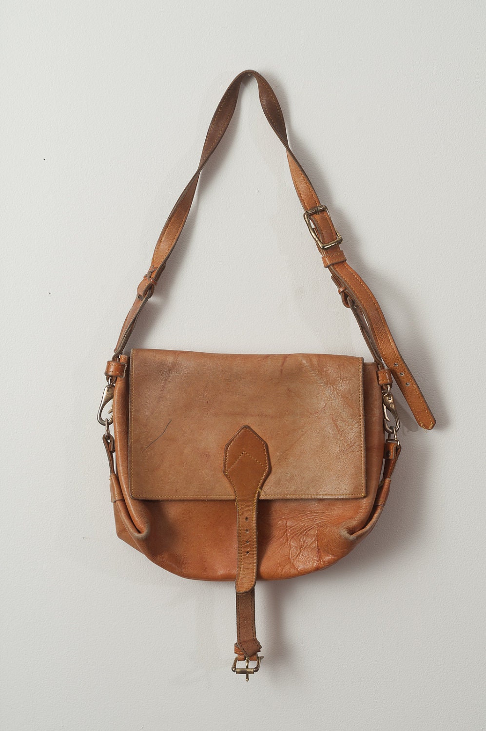 weathered leather satchel
