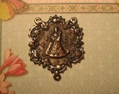 Our Lady of Charity  Fleur de Lis  Bronze Rosary Center